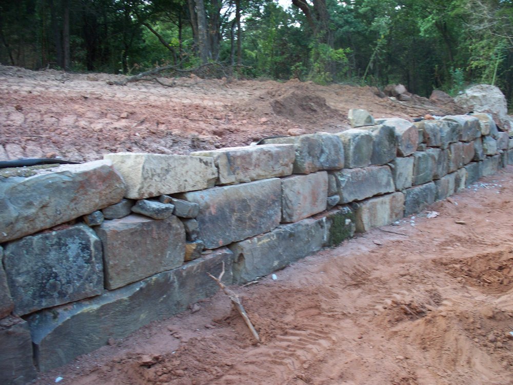 Stone retaining wall from Heartland's hardscaping portfolio